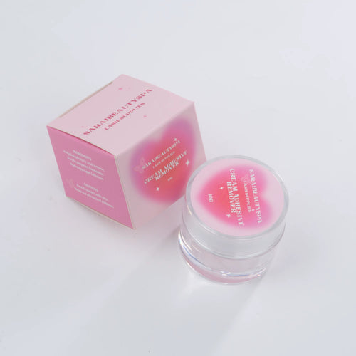 Cream adhesive remover
